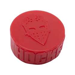 Hockey Skateboard Puck Wax - A large block of green wax shaped like a hockey puck.