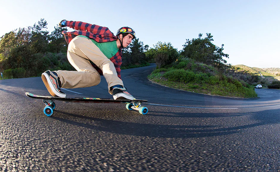Long boarder takes a hard curve