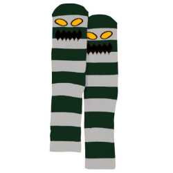 Close-up of Toy Machine socks featuring a large stripe design and a monster face.